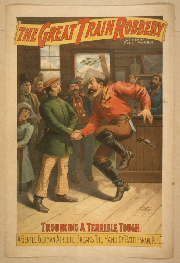 Plakat zeigt eine Gruppe von Menschen mit einem, der eine Waffe hält, ein Fenster und eine Wand im Hintergrund und den Text "Der große Zugraub - Trouching ein Schreckliches Tough" oben und unten.