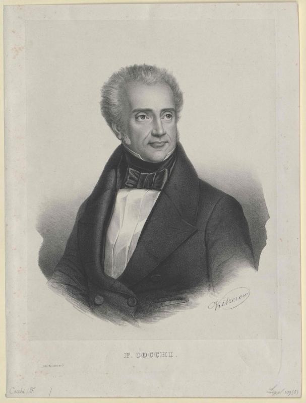 Schwarzes und weißes Porträt des Komponisten F. Cocchi in einem Smoking, mit der Aufschrift "Die Musik der Oper" unten.