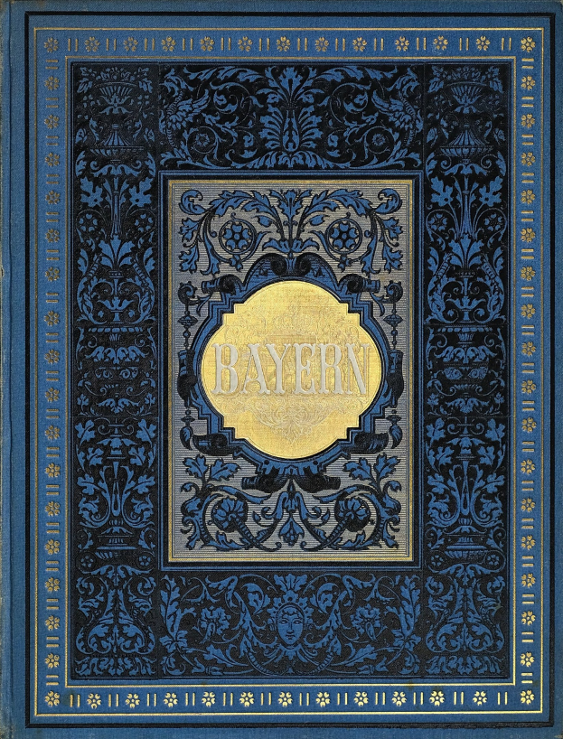 Ein blau-goldenes Buch mit dem Wort "Bayern" auf dem Cover, das mit detaillierten dekorativen Elementen verziert ist.