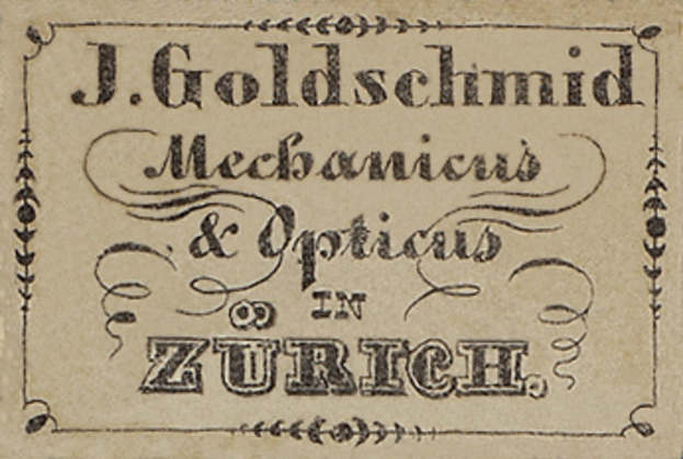 Alte Visitenkarte für "J. Goldschmidt Mechanicus & Optics in Zurich", likely aus dem frühen 20. Jahrhundert, die die Dienstleistungen des Unternehmens auflistet.
