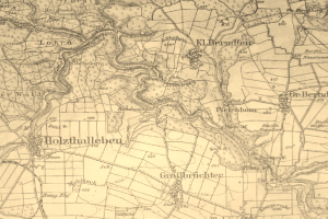 Ein detaillierter alter Stadtplan von Holzthalleben, Deutschland, mit Straßen, Gebäuden und anderen Merkmalen sowie Textbeschriftungen.